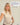 Clienta con su Breeze Top crema y su comentario